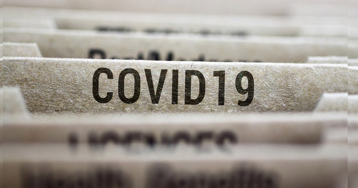 Financial folders with one folder boldy labeled Covid-19